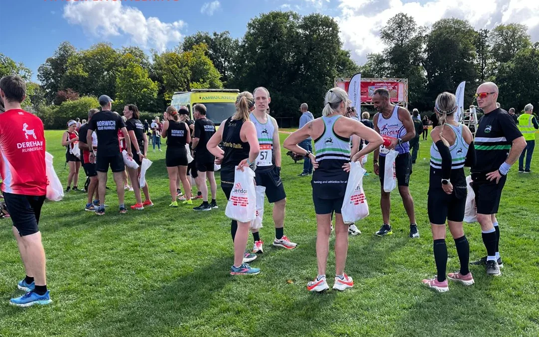 People in active wear talking before a race