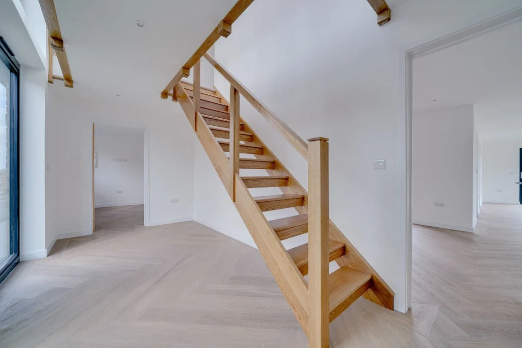 Oak stairs in a newly renovated room